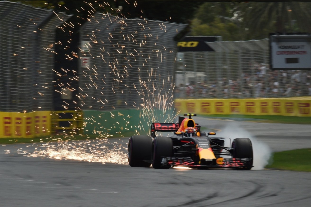 Sparks fly from Daniel Ricciardo's car during the qualifying session for the Formula One Australian Grand Prix.