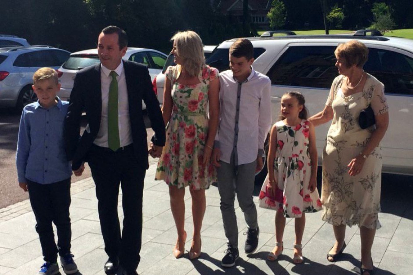 Mr McGowan brought his family, including his wife Sarah and their three children, to the ceremony.