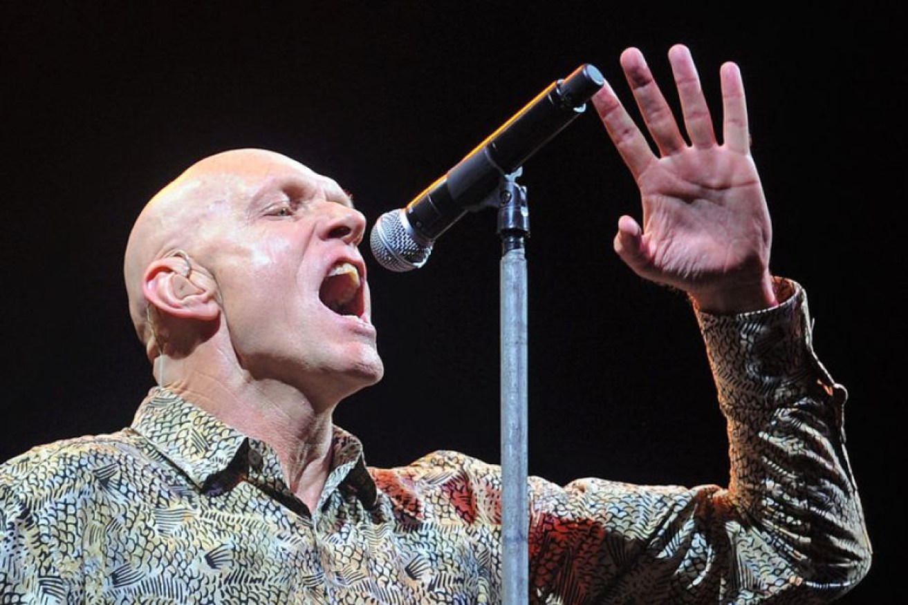 Peter Garrett has lashed out at the resale practices of Ticketmaster. 