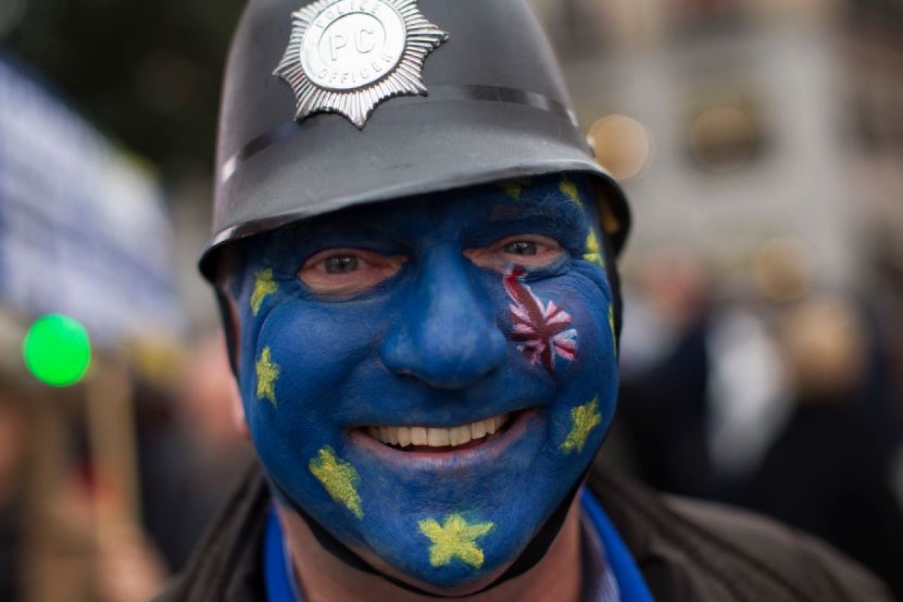 A British citizen wears his sympathies in living colour at a pro-Europe rally in Spain - one of several anti_Brexit demonstrations across the Continent.