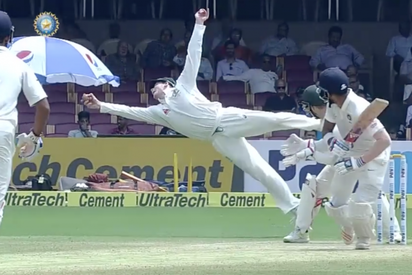 Steve Smith takes a classic catch off the bowling of Steve O'Keefe. 