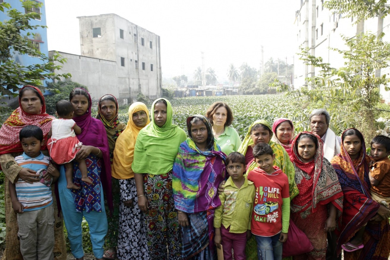 Survivors of the Rana Plaza garment factory collapse revisit the site with Oxfam Australia Executive Helen Szoke.