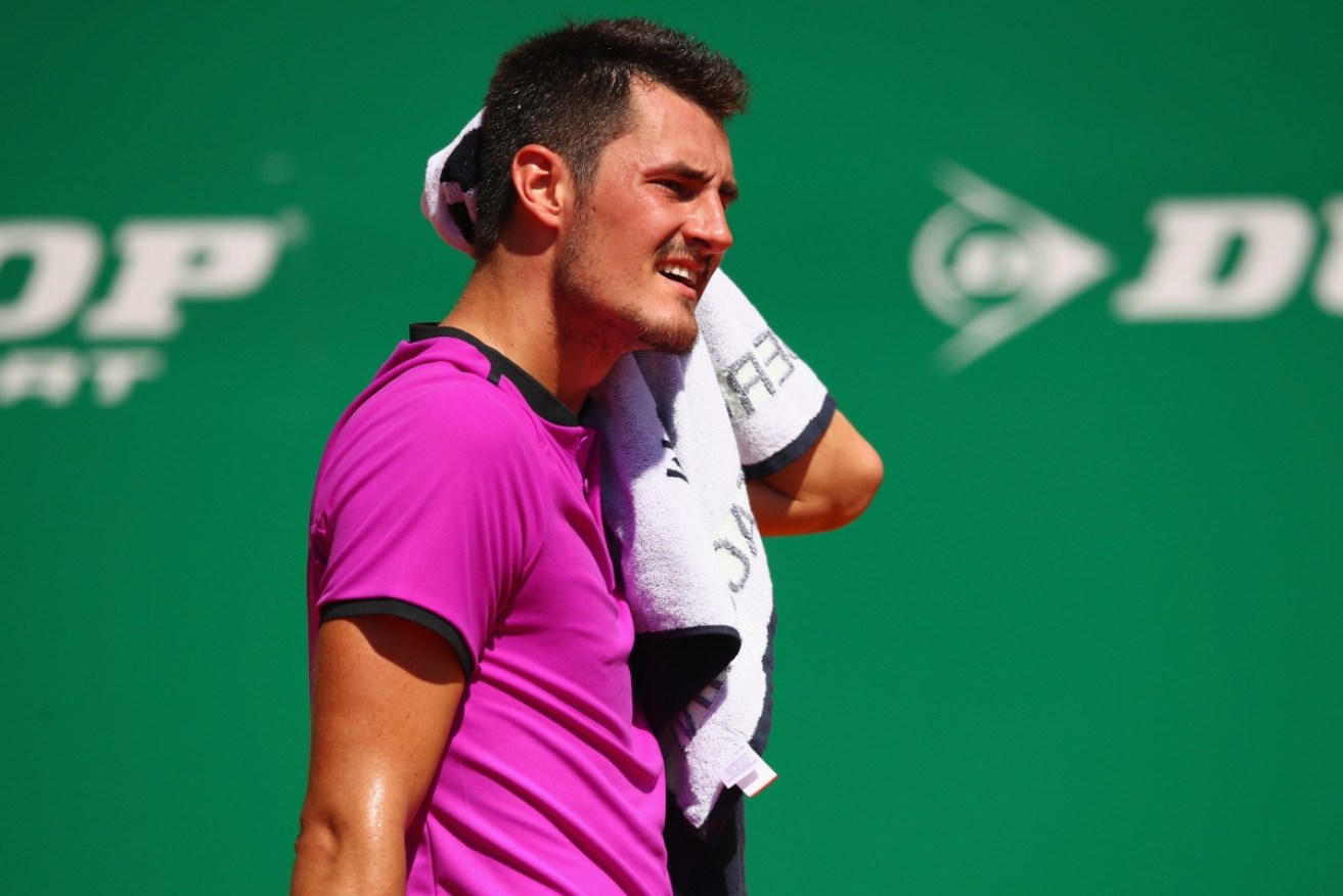 Bernard Tomic shows his dejection during his straight sets defeat to Diego Schwartzman.