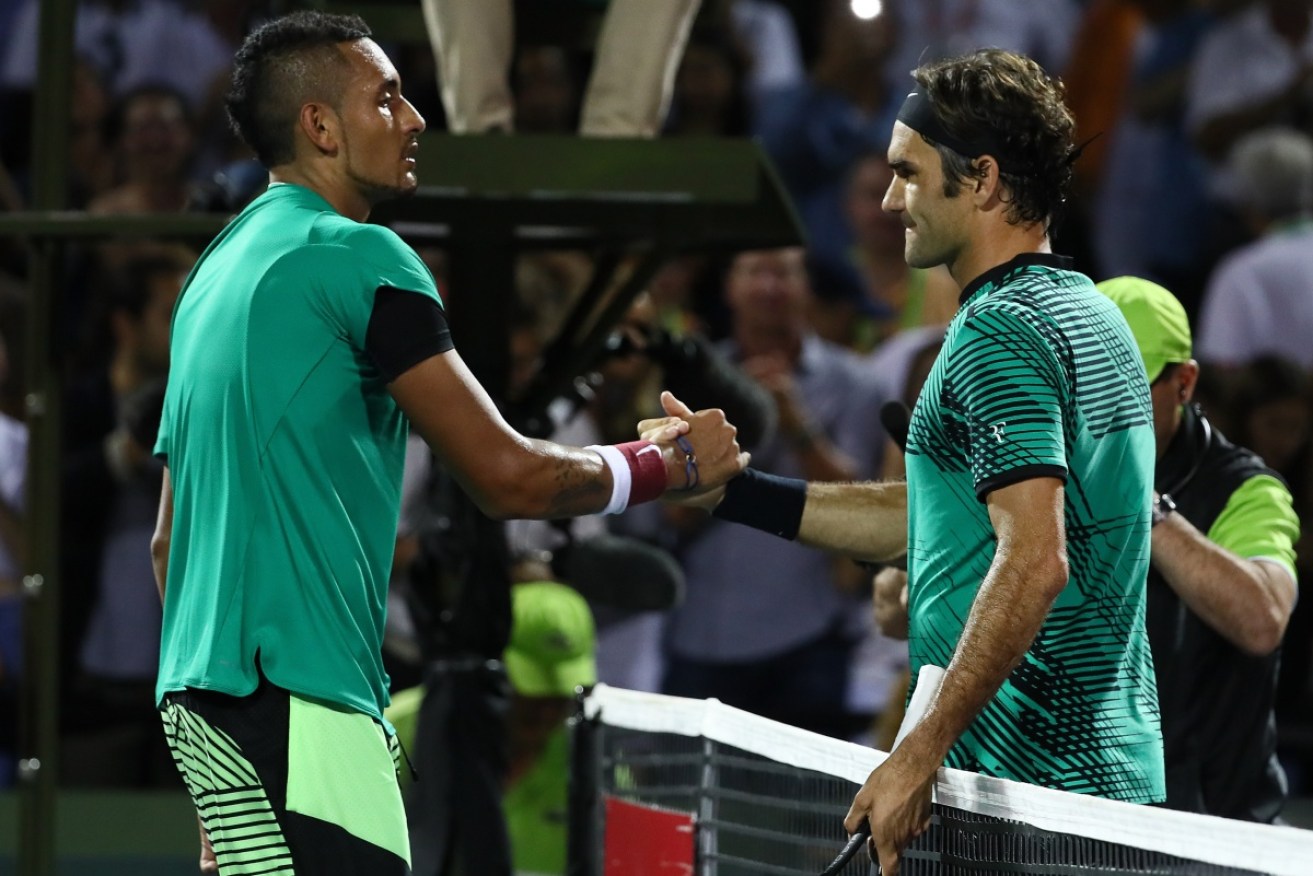 Kyrgios smashed his racket in frustration but still managed a warm handshake with Federer after losing their hard-fought duel in Miami.