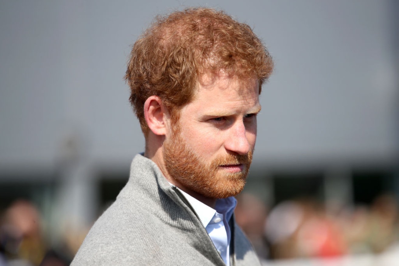 Prince Harry was forced to defend Markle in a rare statement.