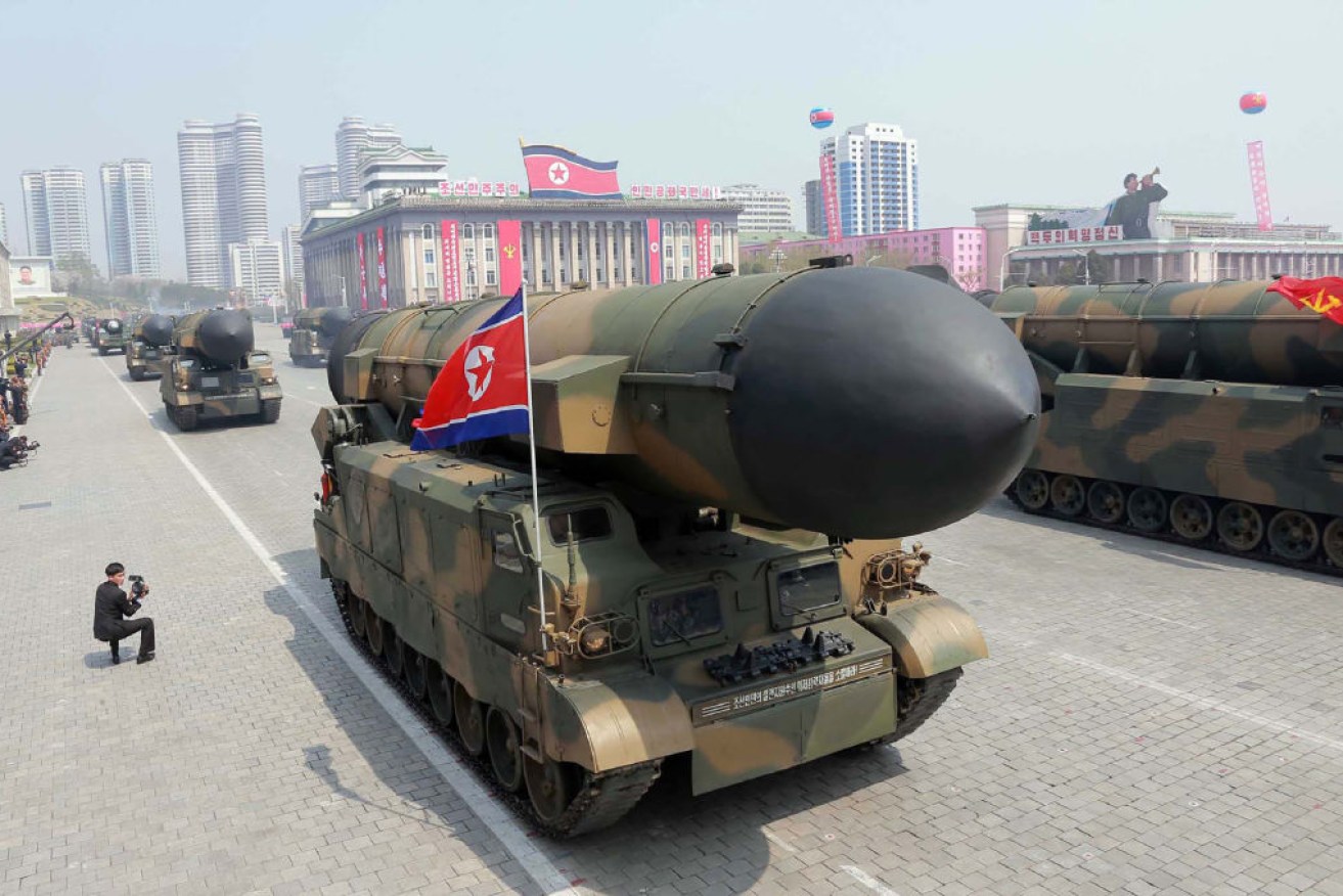 North Korean ballistic missiles being displayed through Kim Il-Sung square during a military parade in Pyongyang.