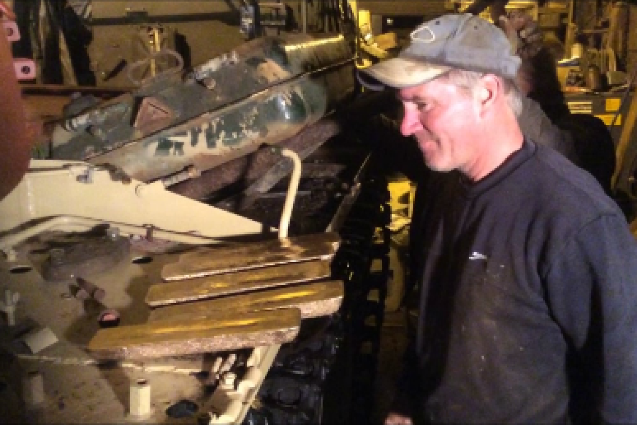 British restorers found five gold bars inside an old Iraqi tank.