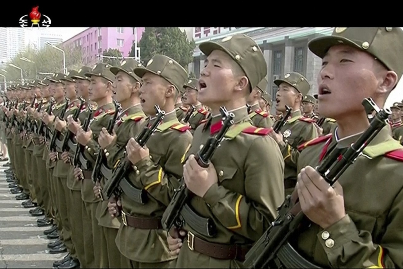 Soldiers take part in a parade at Kim Il Sung Square in Pyongyang.