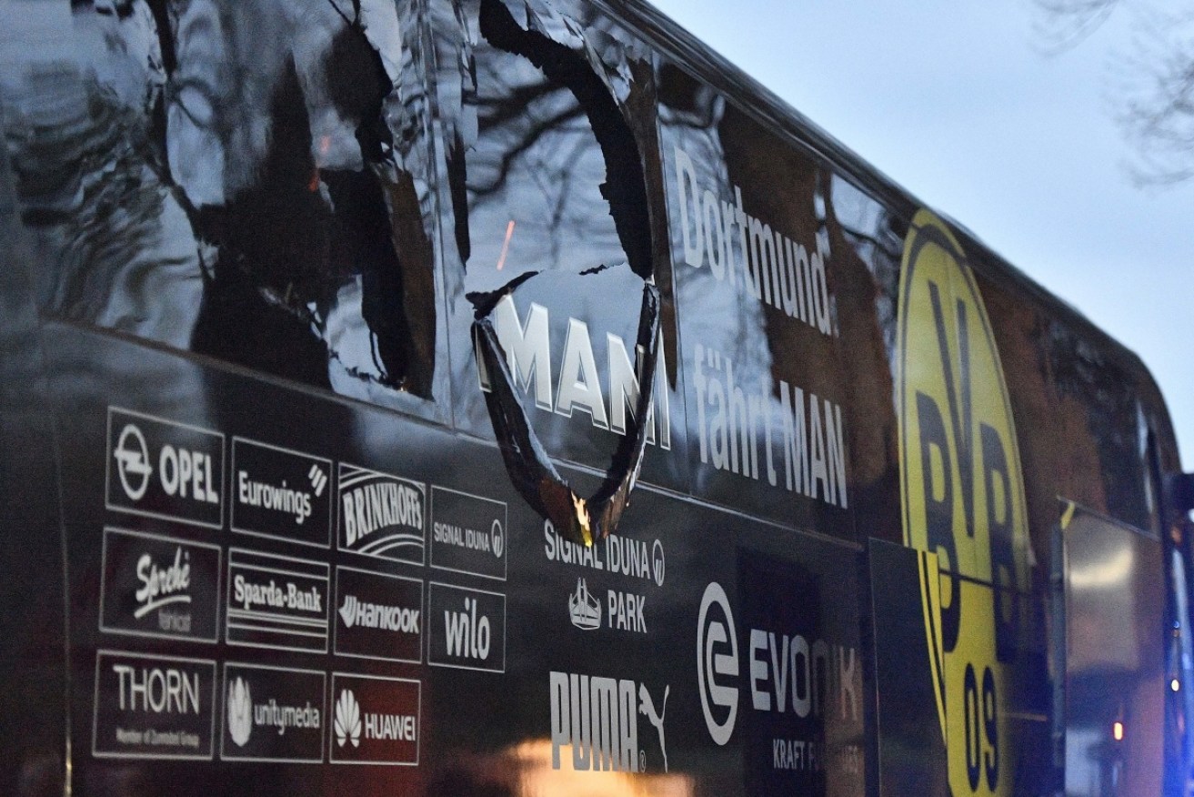 Damage to the football team's buss caused by the three blasts. 