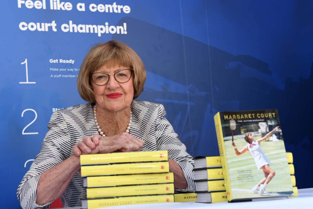 Margaret Court with copies of her book at January's Australian Open.