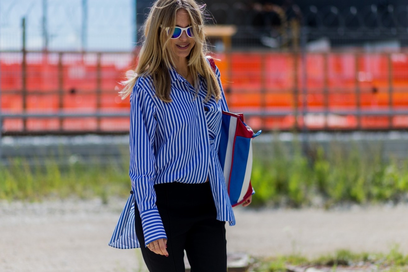 Can't decide whether to tuck your shirt in or not? Do both, like this style maven.