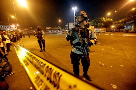 Three police officers killed in Jakarta suicide bombing at busy bus stop