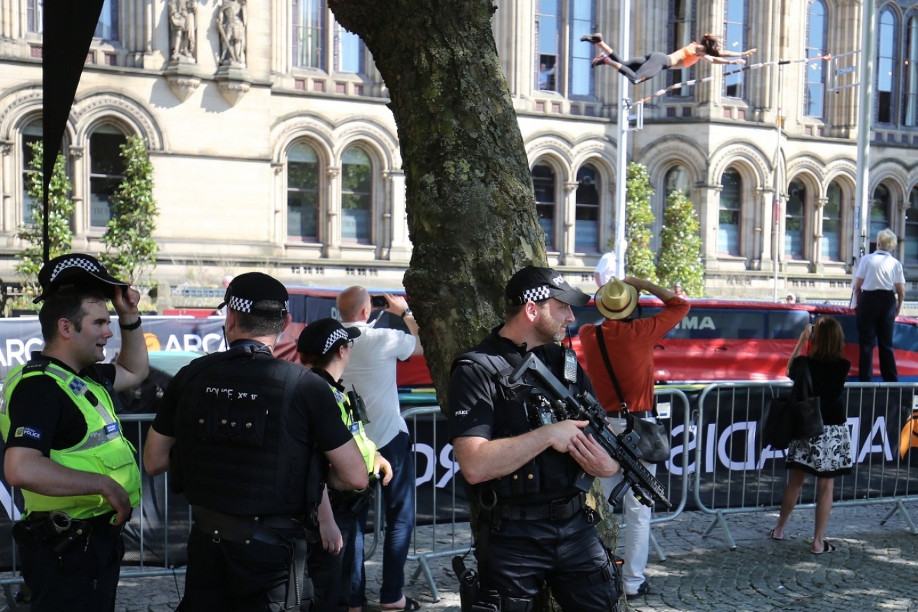 Police patrol  Manchester's streets as the hunt for clues and accomplices continues. Photo: EPA