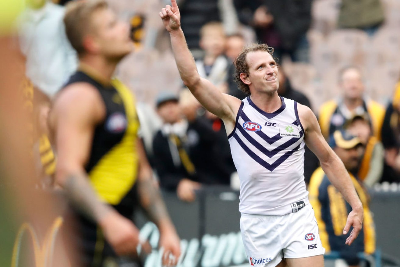 Dockers hero David Mundy celebrates his goal after the siren to sink the Tigers.