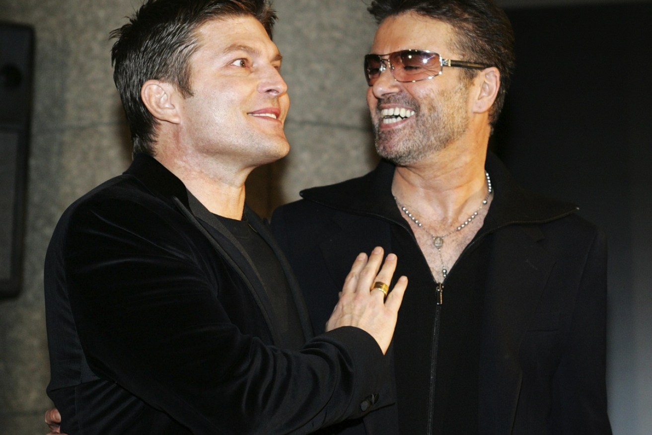 Kenny Goss with partner George Michael in 2005.