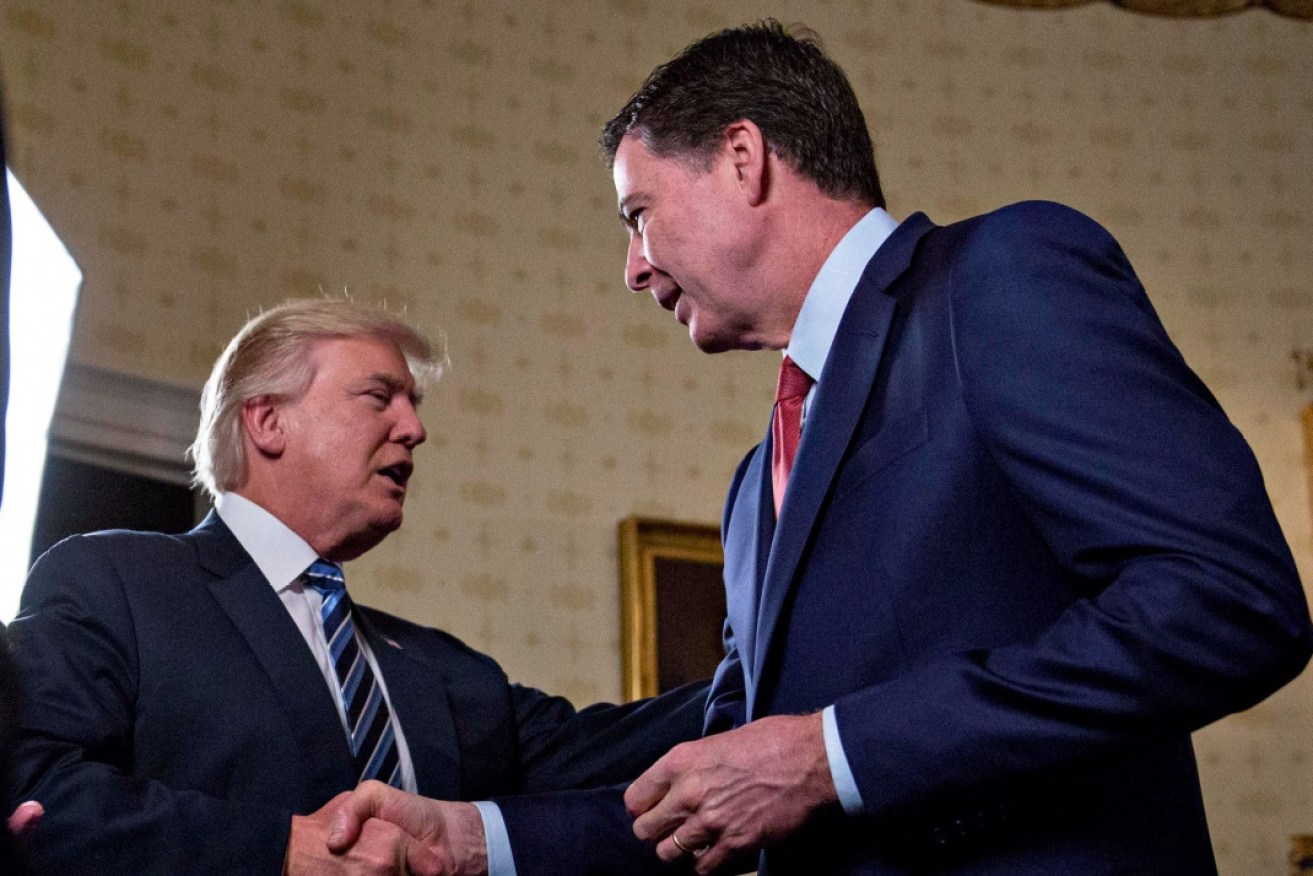 James Comey (right) writes that Donald Trump pressured him to bury the Russia-Trump inquiry.