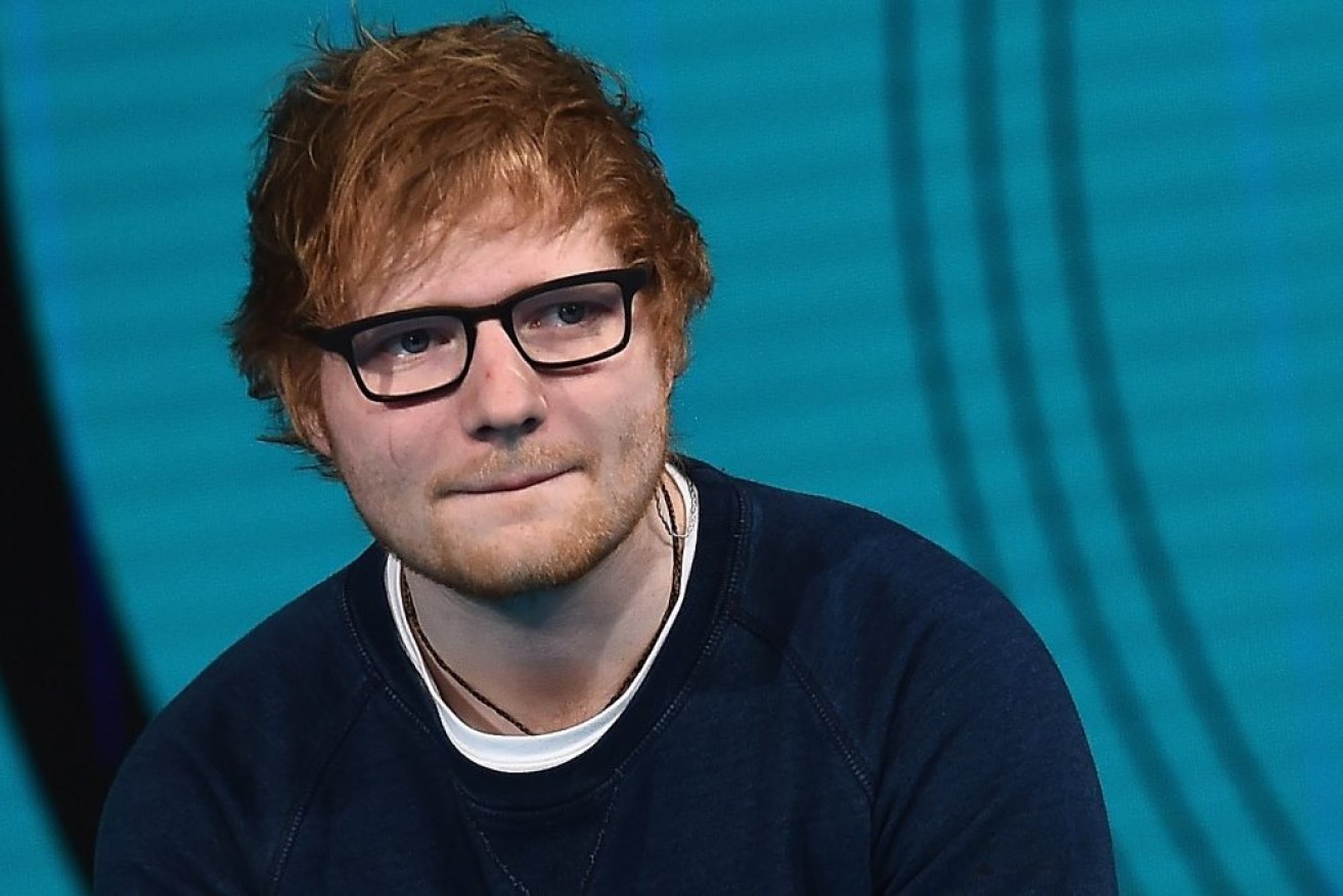 Ed Sheeran has been hit by a car in London after being knocked off his bike.