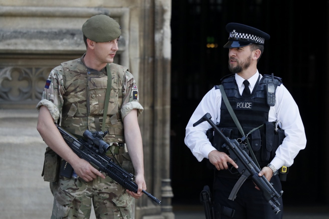 Heavily armed soldiers and police have flooded the streets of Britain after the suicide attack.