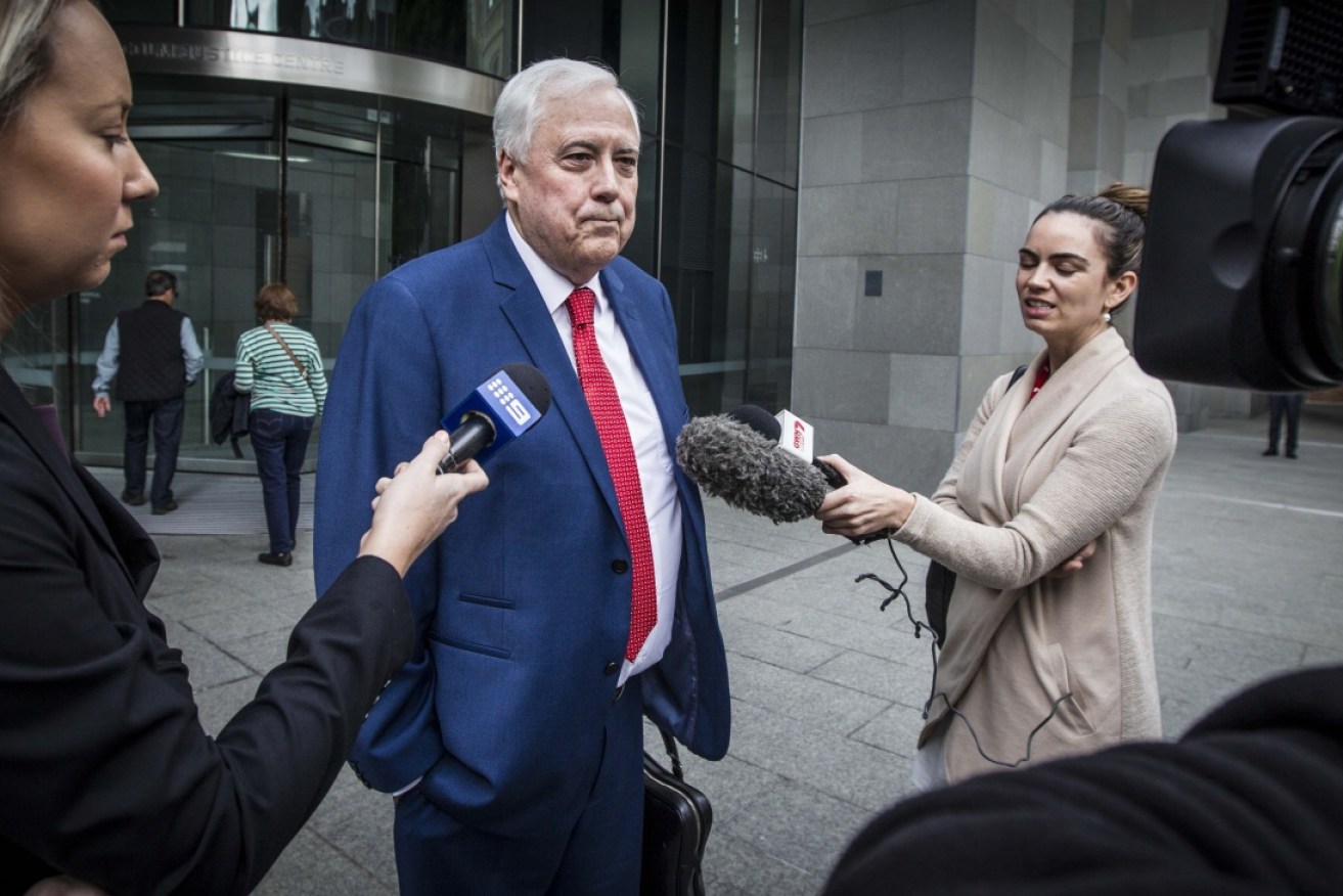Australian businessman Clive Palmer speaks to the media at the Perth Supreme Court on June 14, 2017. 