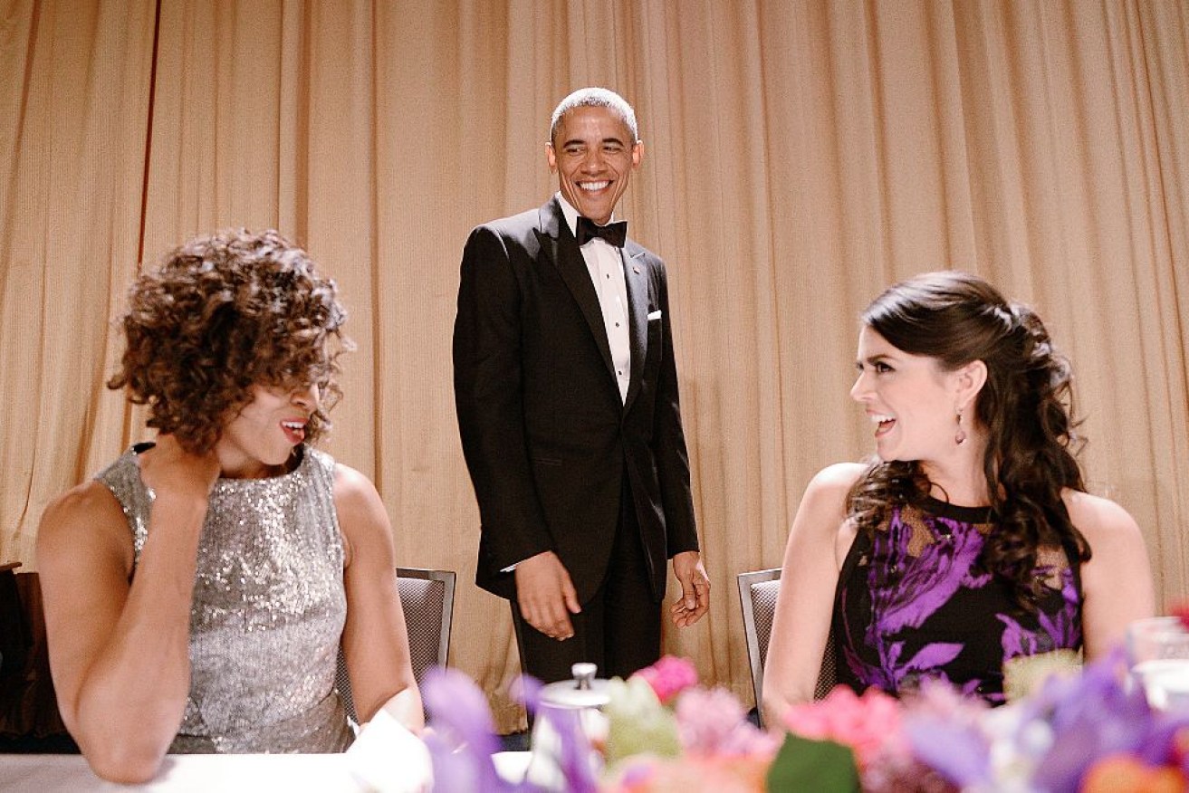 Barack Obama with wife Michelle and comedienne Cecily Strong at the White House Correspondent's Association Gala in 2015.