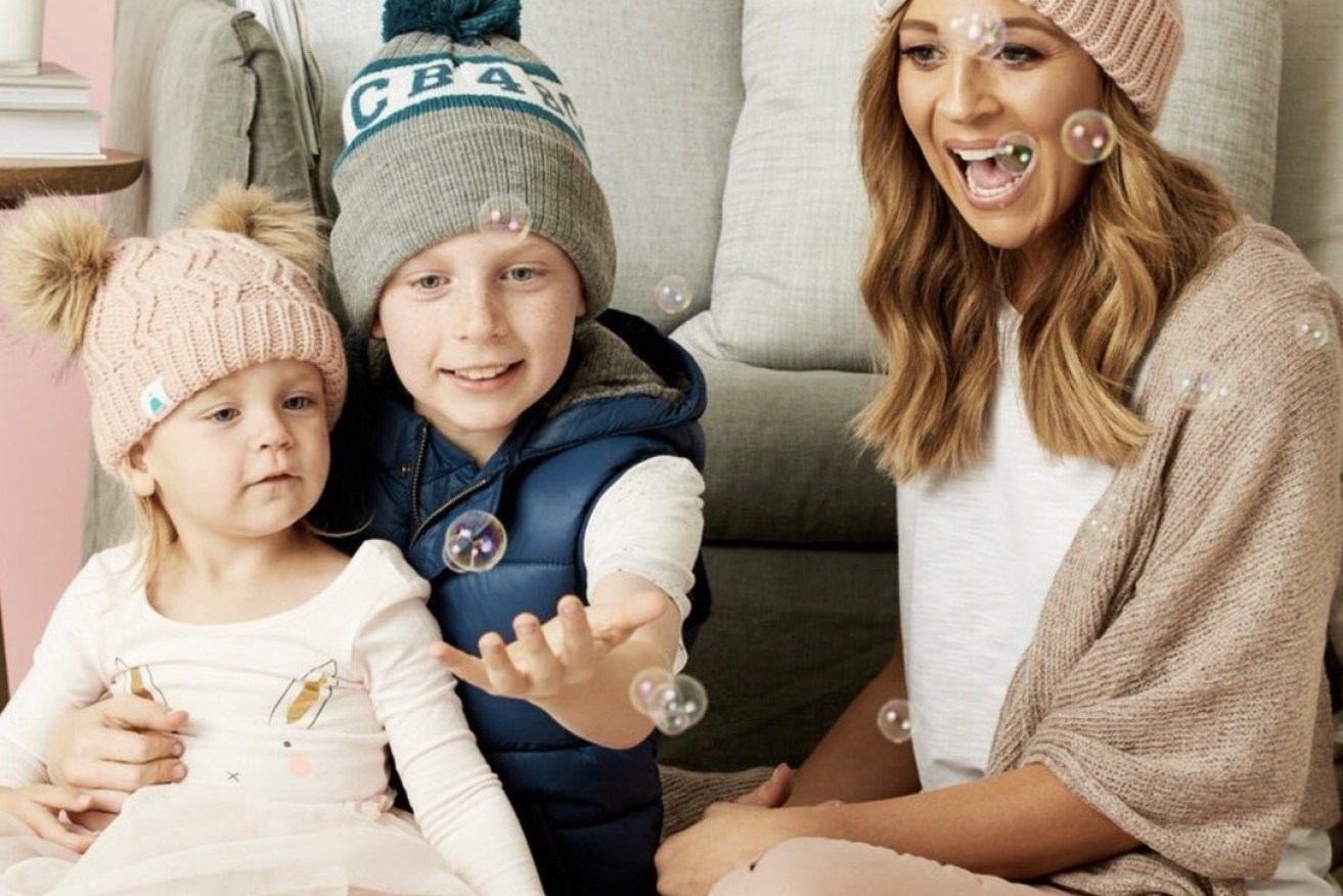 Carrie Bickmore's beanie fundraiser clashed with a prominent annual AFL charity event.
