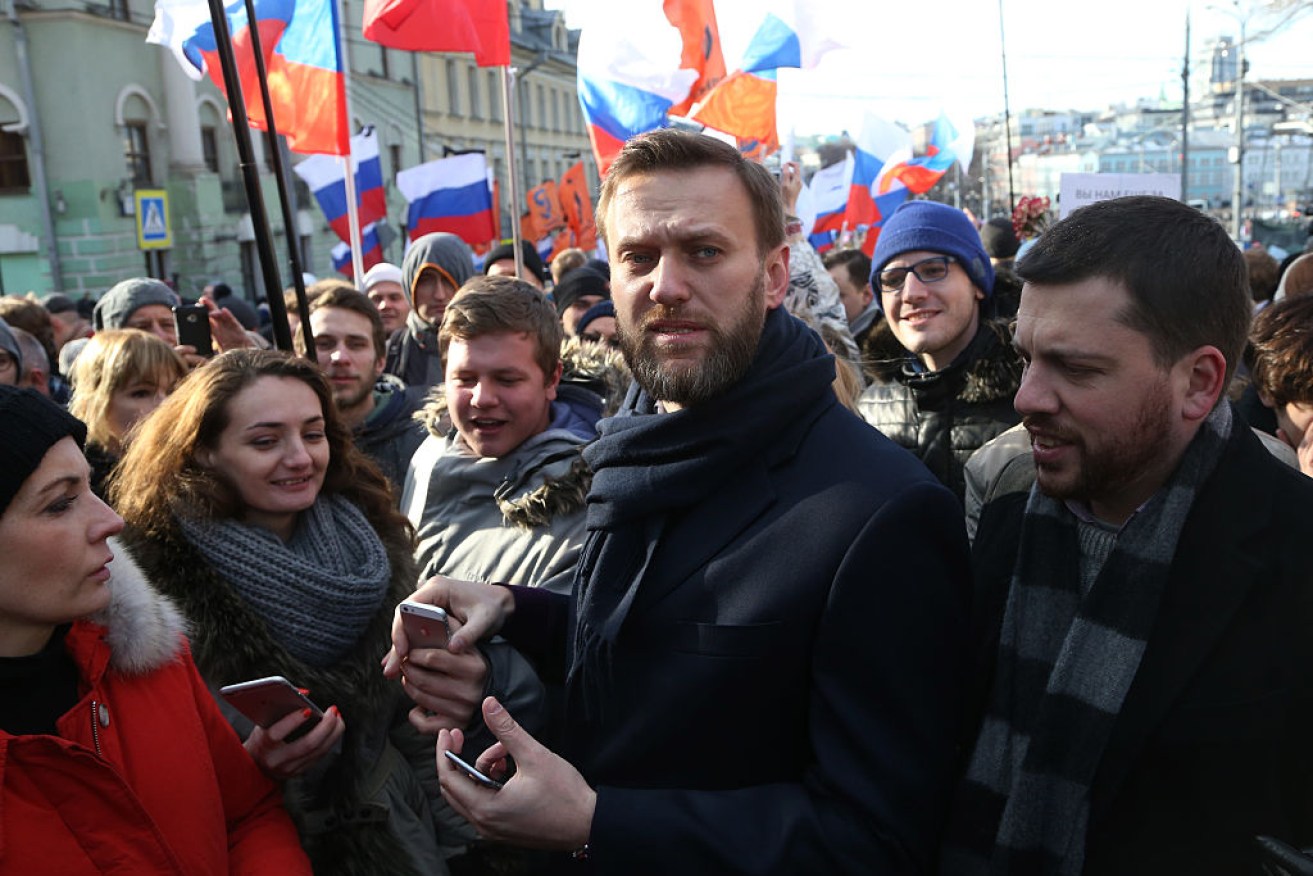 Alexei Navalny attends a march marking the one-year anniversary of the killing of opposition leader Boris Nemtsov in Moscow.
