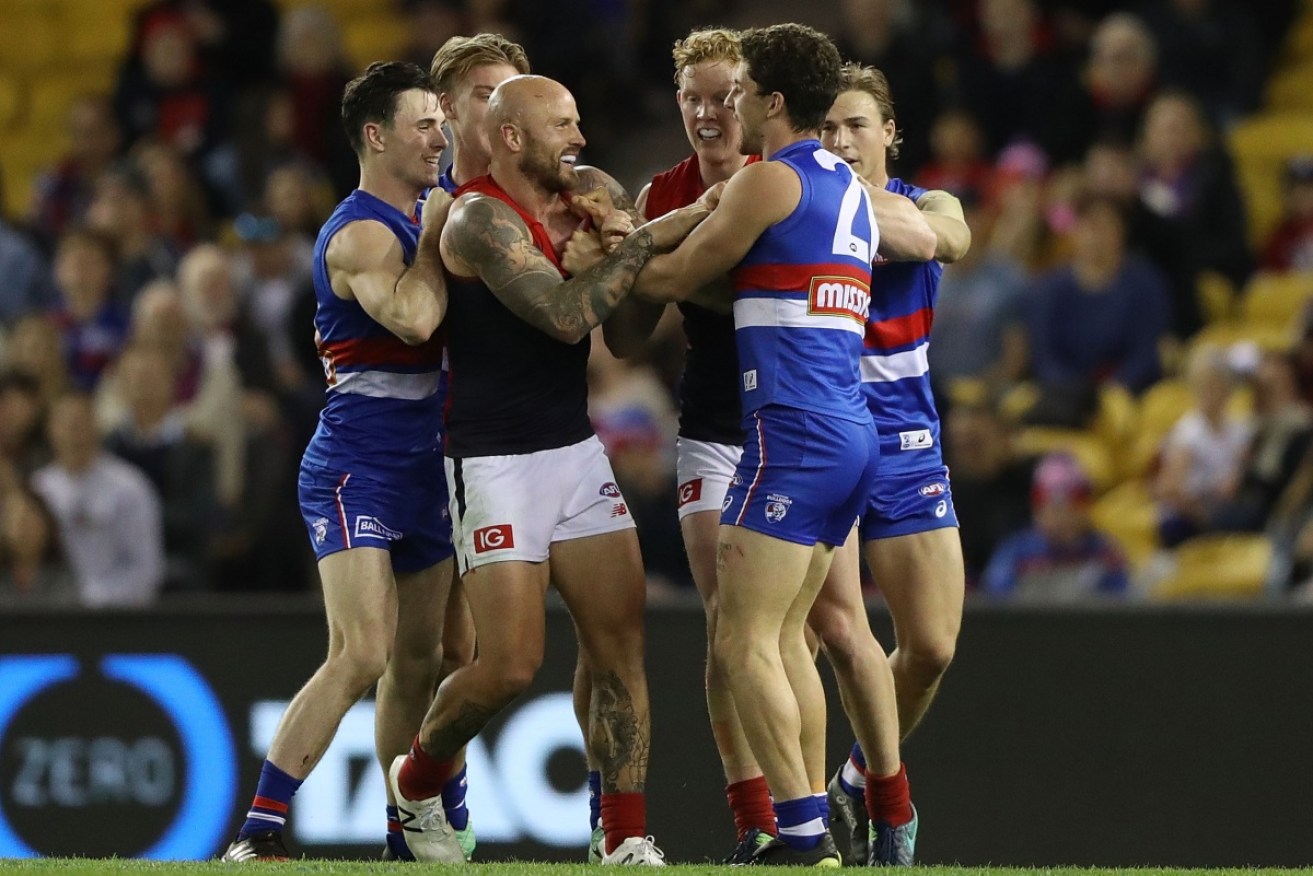 Melbourne bested the Western Bulldogs by 57 points in a spiteful contest.