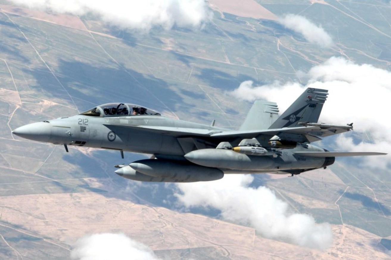 Australia has temporarily halted air operations over Syria.