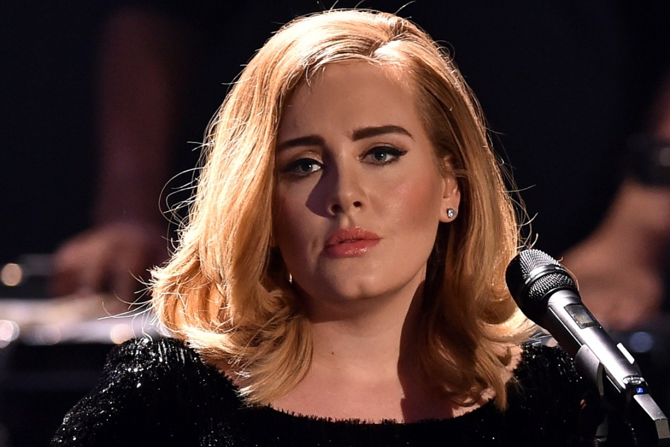 Adele says she's "a real homebody" who doesn't enjoy life on the road.