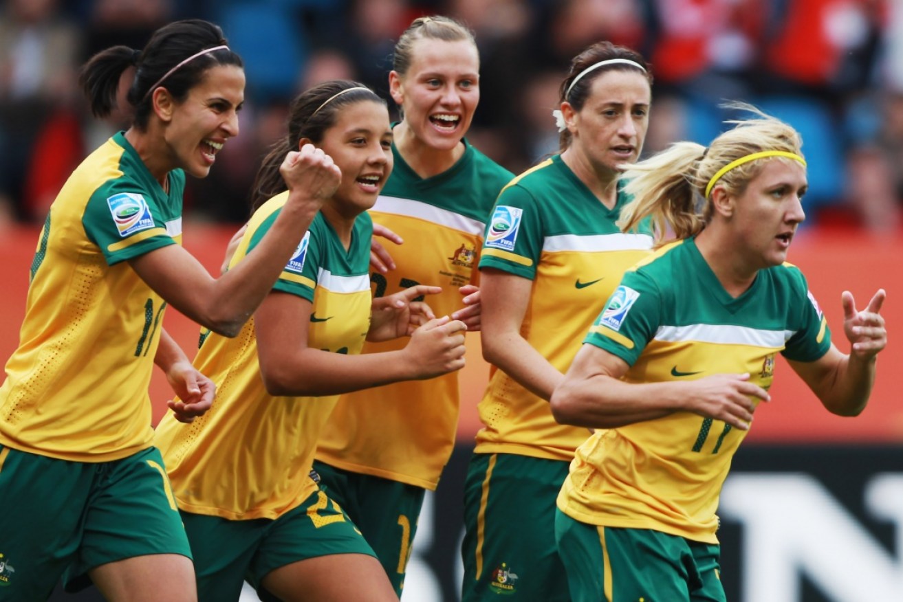 Australia celebrates a goal in the FIFA World Cup 2011.