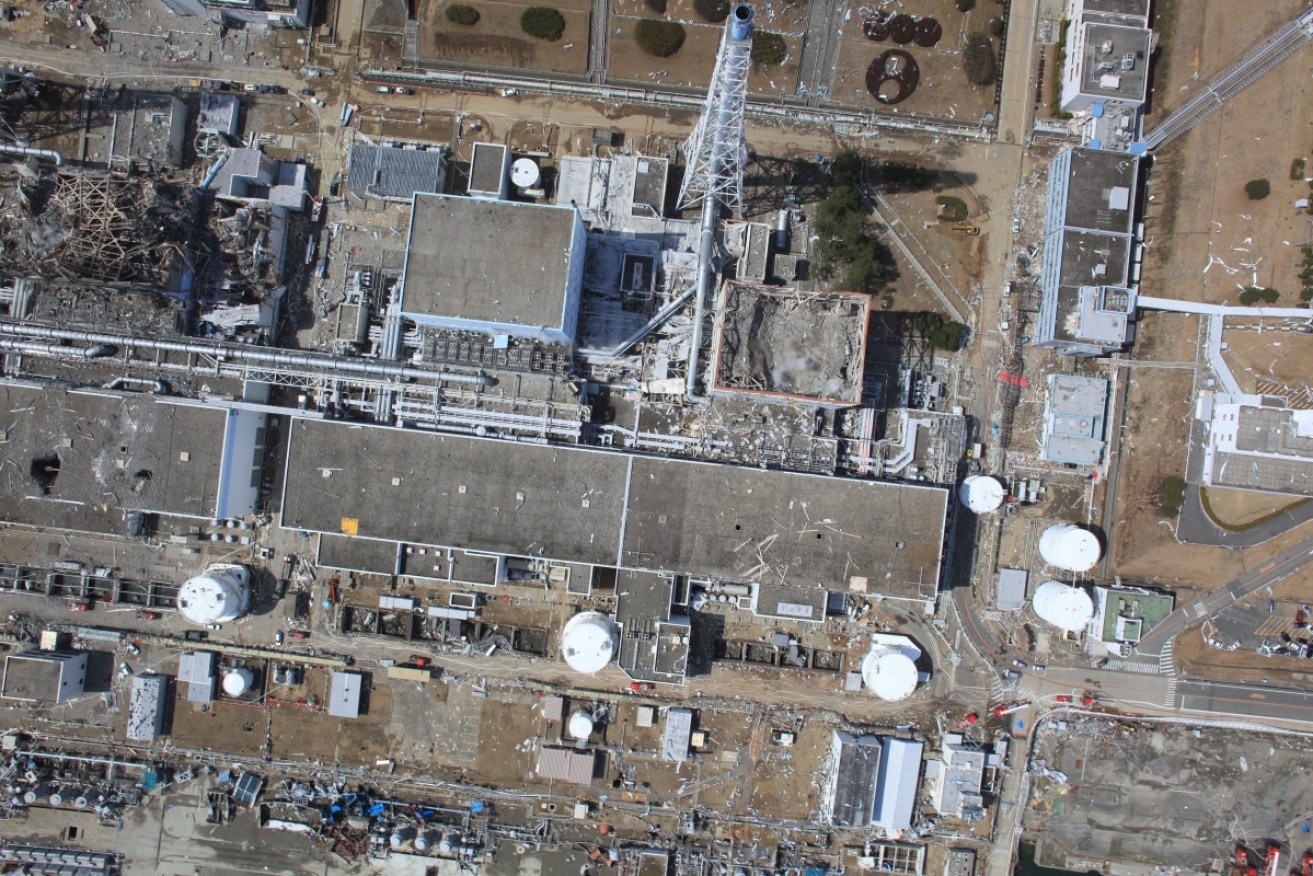 An aerial photo showing the damaged units of the Fukushima power plant. 