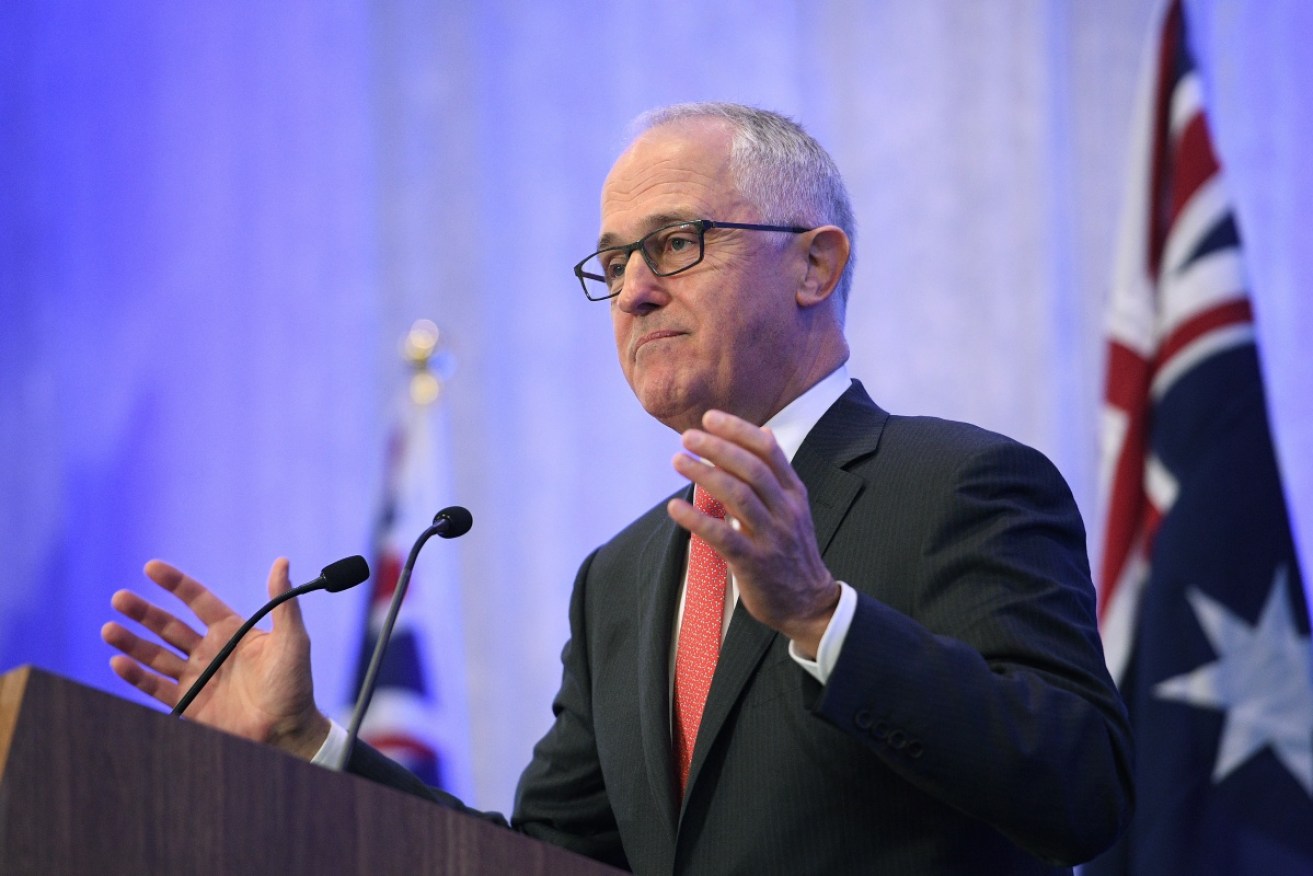 Mr Turnbull declared himself sick of politics and personalities in a fresh dig at Tony Abbott on the first anniversary of his election. Photo: AAP