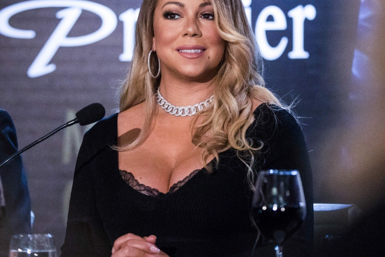 Mariah Carey claims she doesn't pay attention to politics and is more interested in food.