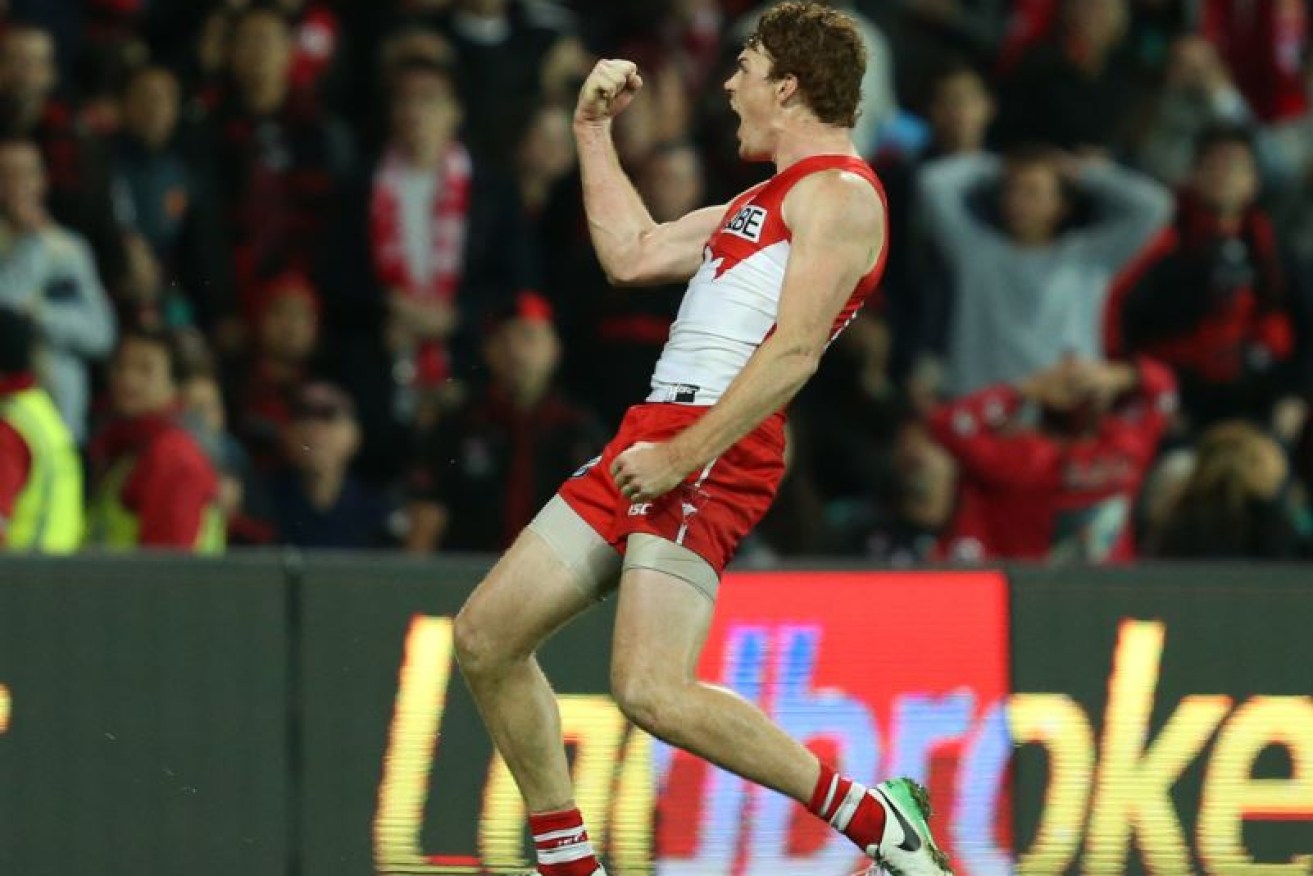 Gary Rohan of the Swans celebrates scoring the match-winning goal after the siren at the SCG.