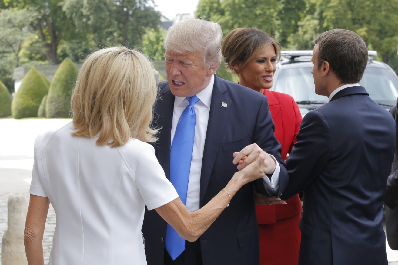 Madame Macron gets a quick once-over and an unwanted compliment from President Trump.
