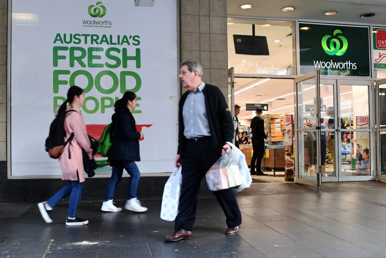 Woolworths and Coles supermarkets have both committed to banning single-use plastic bags within 12 months