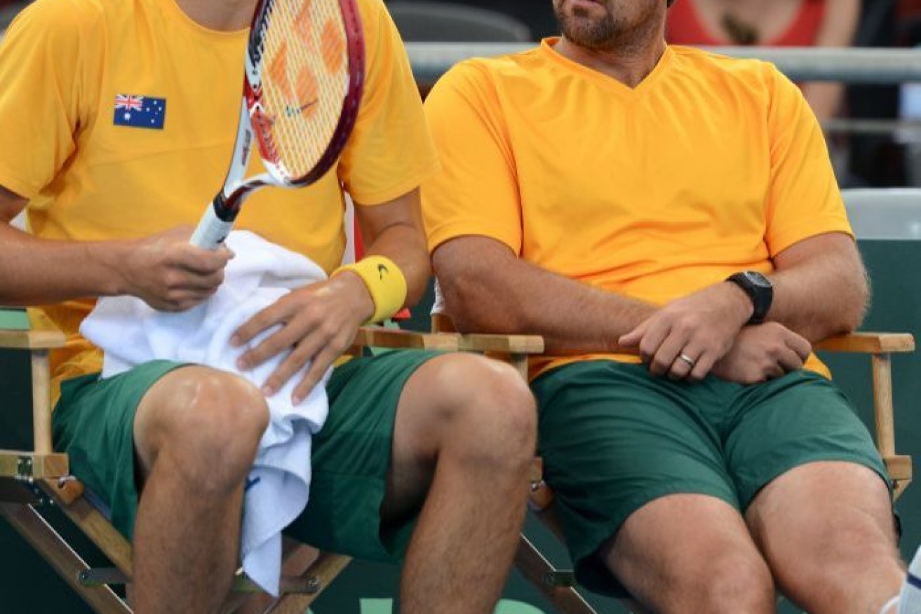 Pat Rafter (R) says he regrets how he handled Bernard Tomic during his time at Tennis Australia.