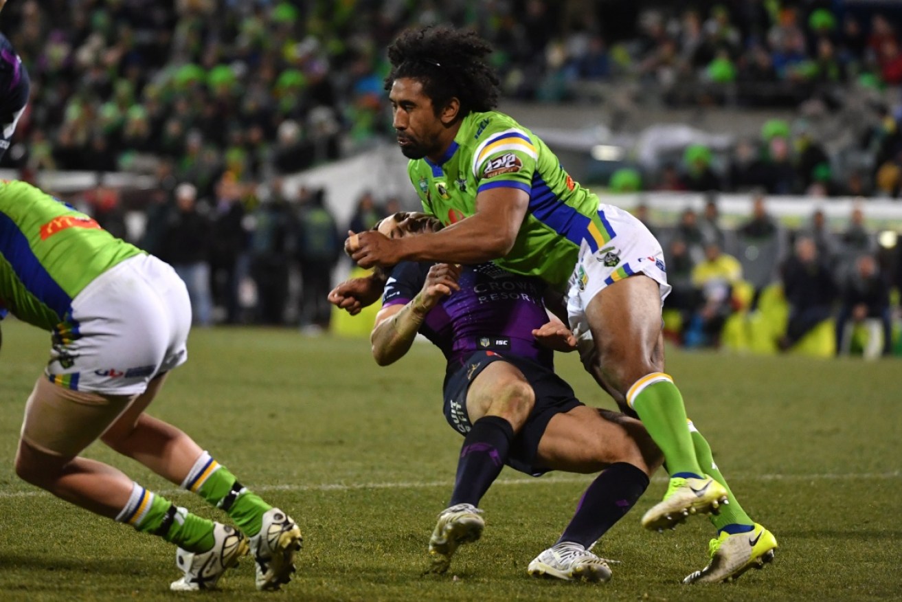 Billy Slater is flattened by Sia Soliola. And he's still feeling the effects.