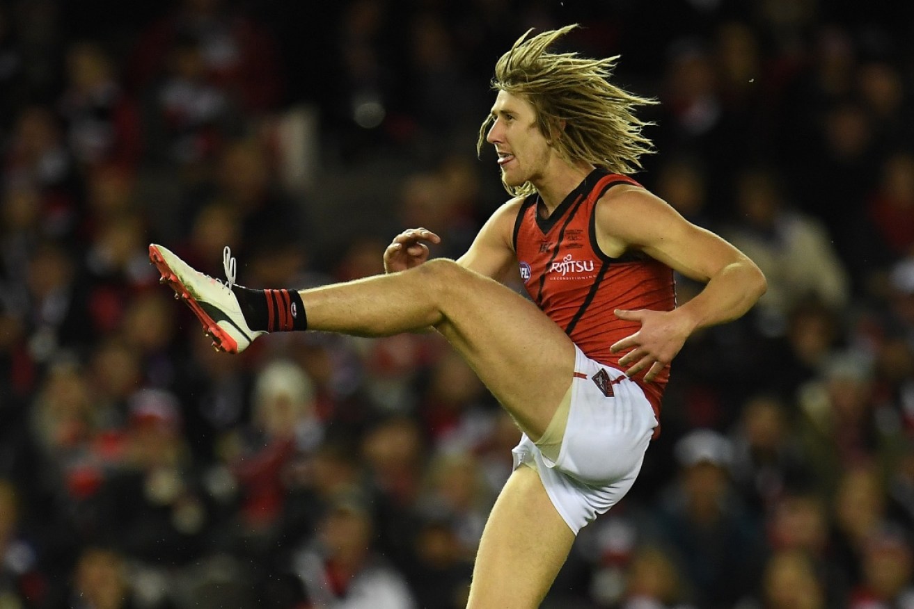 Essendon's captain Dyson Heppell keeps their season alive as finals firmly on his radar. Photo: AAP 