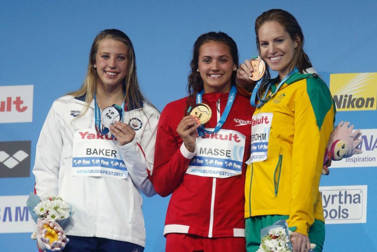 Emily Seebohm on the podium with world championship bronze.