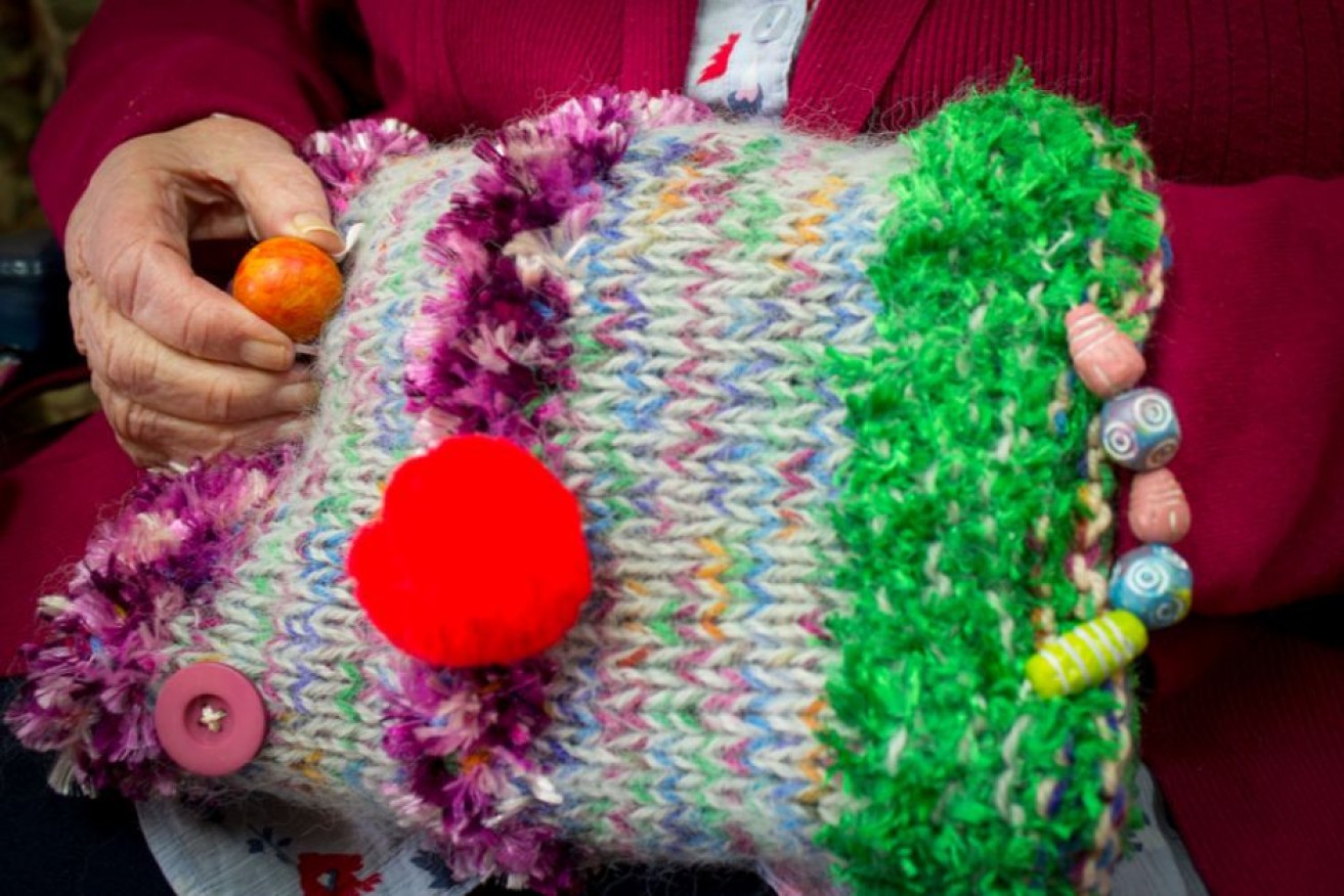 Fiddle muffs have beads, squishy balls, buttons, ribbons and other quirky gadgets sewn into them.