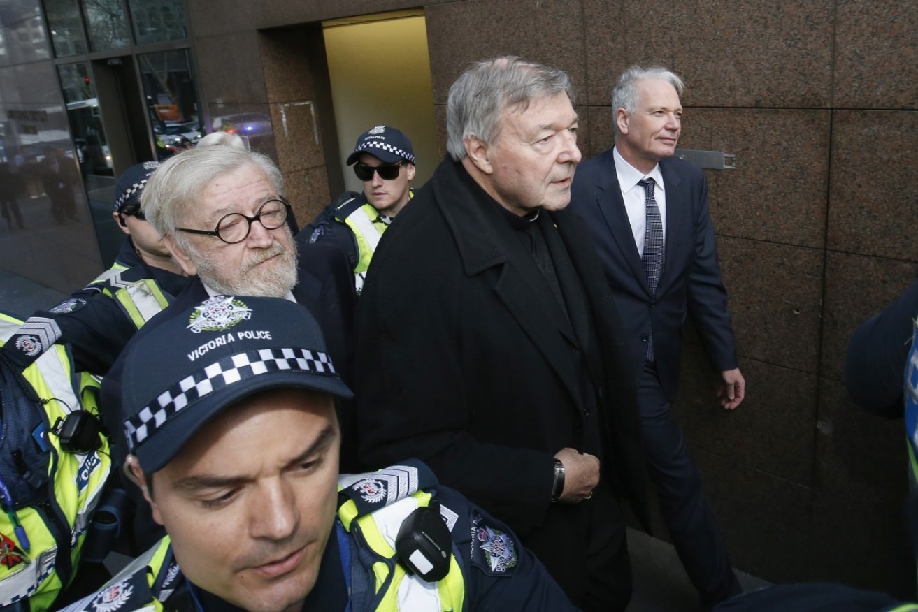 George Pell arrives at Melbourne Magistrates' Court on historical sexual offence charges.