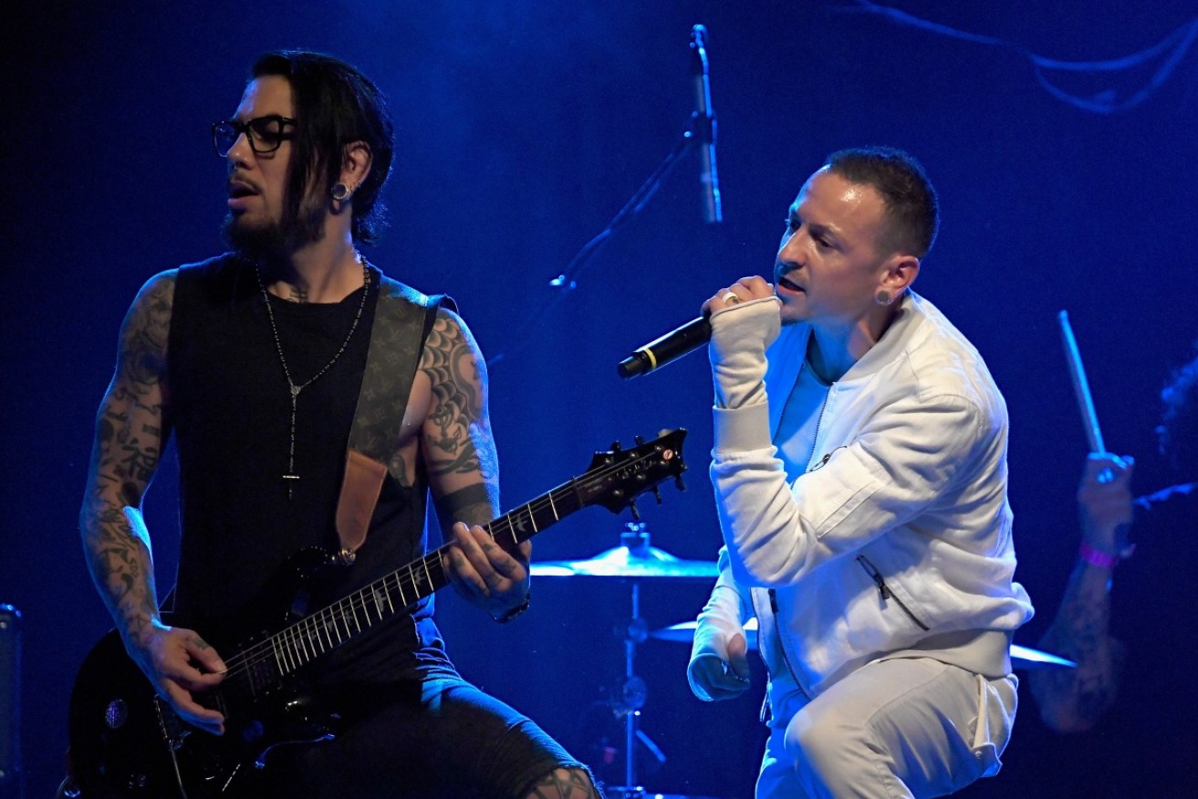 Linkin Park lead singer Chester Bennington (R) apparently took his own life.
