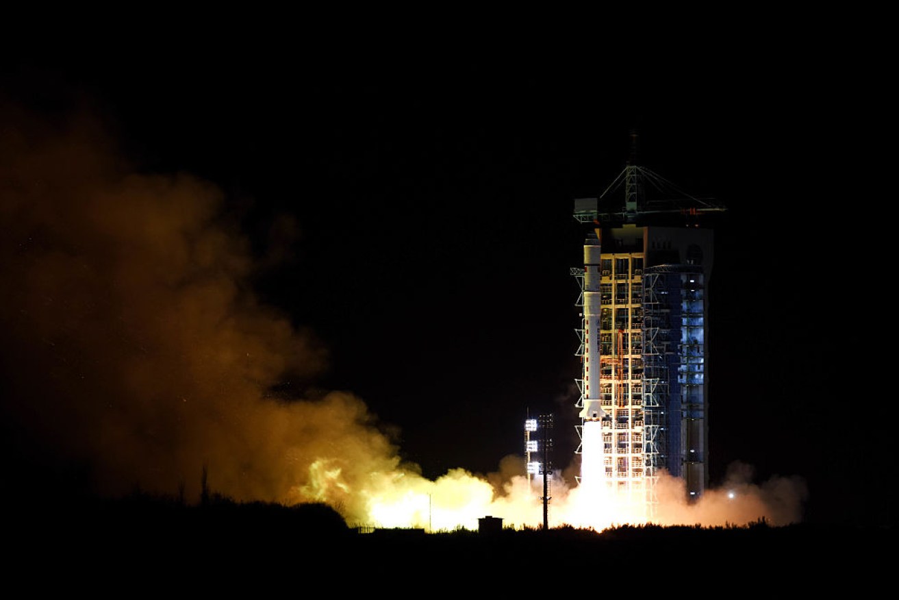 Chinese researchers have teleported a photon to a satellite launched last year by a Long March rocket (pictured).