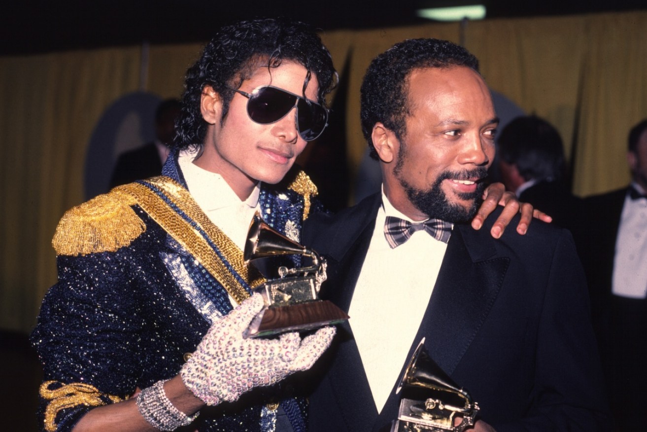Michael Jackson's estate owes Quincy Jones (R) $11.7 million in royalties and production fees.