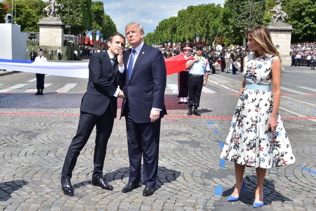 US President Donald Trump maintained an uncomfortably long grip of Emmanuel Macron’s hand during Bastille Day. 