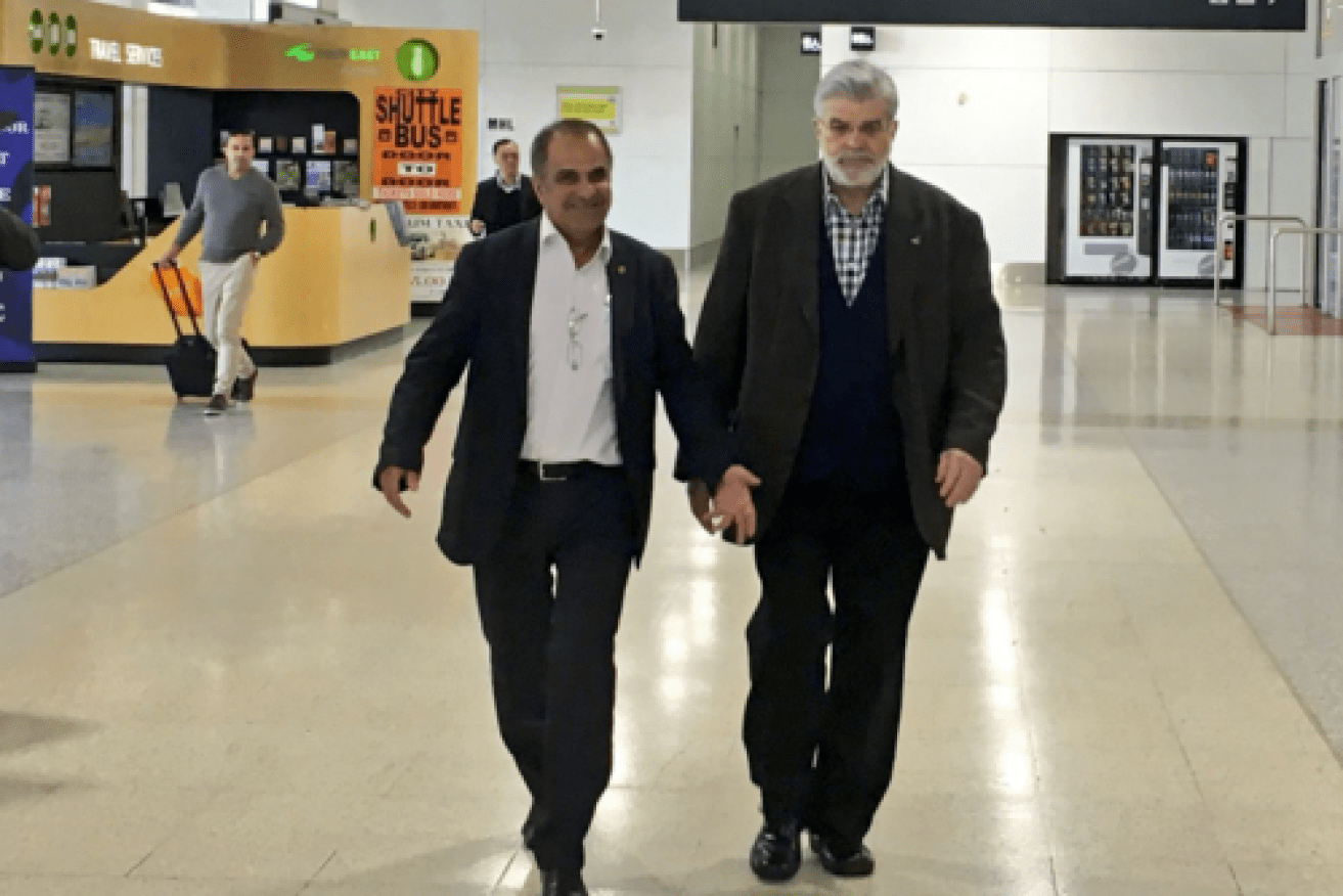 The Victorian MP Khalil Eideh still managed a smile at Melbourne airport on Saturday after a long flight from Canada. Photo: Twitter