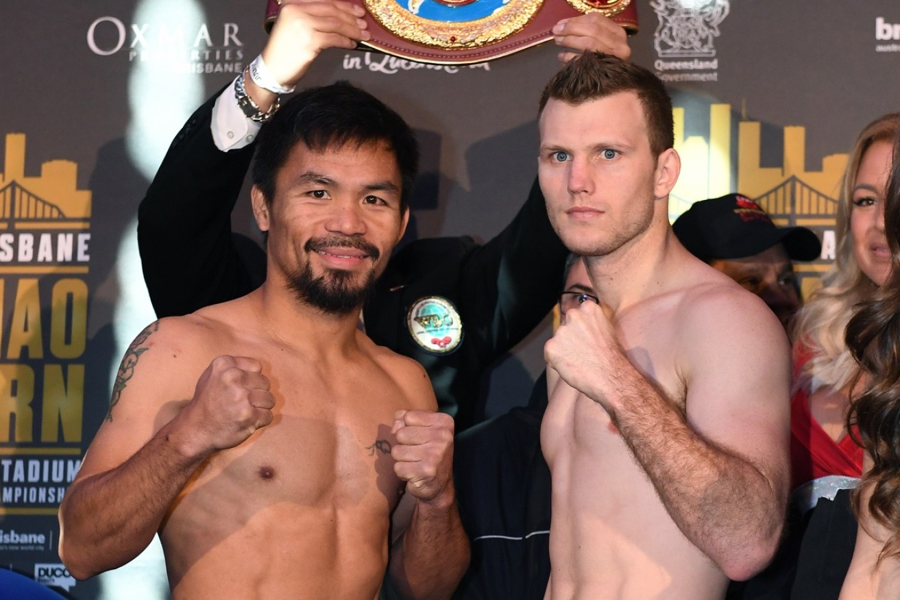Manny Pacquiao and Jeff Horn after the weigh-in on Saturday. Photo: AAP