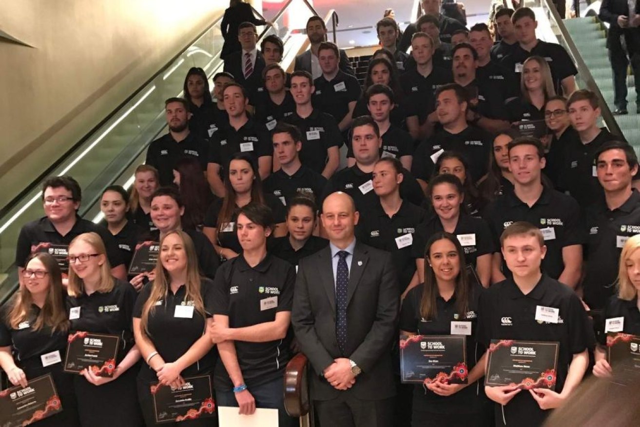 NRL chief executive Todd Greenberg with the graduates.