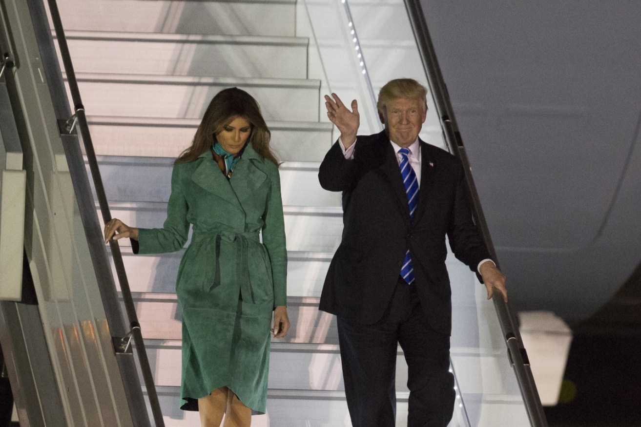 US President Donald Trump and Melania Trump arrive in Poland. 